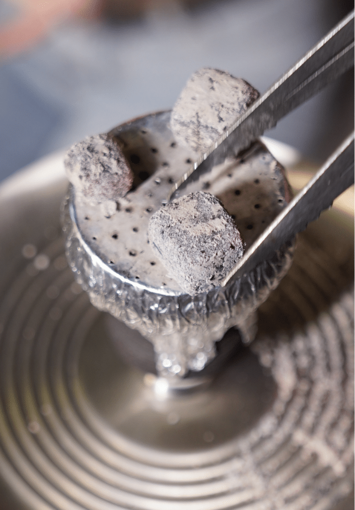 Photo Coconut charcoal briquette for shisha - Coconut product supplier